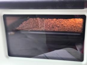 烤箱预热好180度15分钟，中途取出翻拌均匀。