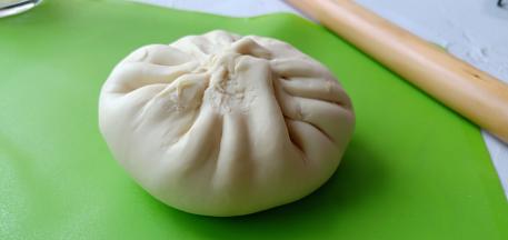 包包子一样包起来。