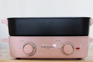 多功能锅旋转至小火，时间设置20分钟，开始热锅。