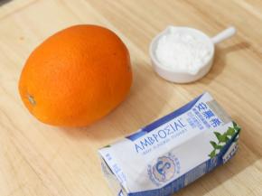 香橙1个、牛奶100g、糖适量（视香橙的甜度添加）