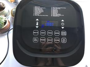 空气炸锅按Pre键200度5分钟，再摁Stage键设定180度15分钟。
