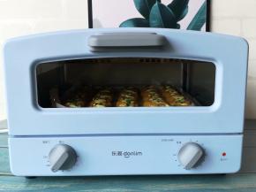 烤箱上下火180度预热10分钟，把烤盘放入烤箱中层，上下火180度烤15分钟左右