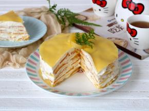 芒果切片铺的，这样做出来的蛋糕平整一些