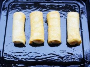 放入刷了一层油的烤盘。