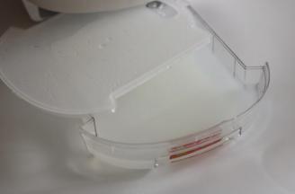 蒸完后米中含的淀粉糖会自然漏入米汤盒中。