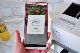 烹饪结束，机器响起清脆而响亮的提示音，打开机器，就能看到已经炒好的菜了。