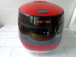 按【蒸饭键】静等米饭就可以。