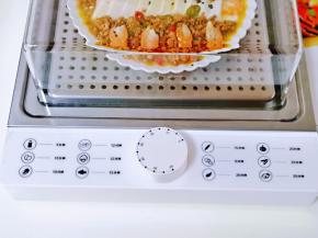 将蒸汽锅连接电源，开关旋钮到10分钟位置。