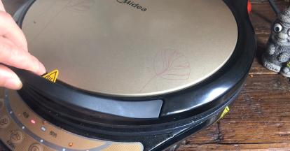 再盖上盖子烤2分钟左右