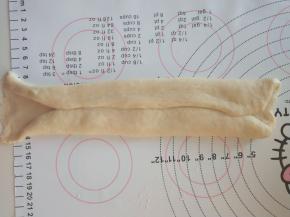 8．取一个面团擀长，翻面后两边向中间折叠。