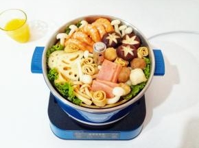 臻米智能升降火锅最大的特色就是它的升降功能，轻轻按一下上升/下降按键，火锅里面的提篮就会缓缓升起，食材全部呈现在眼前。