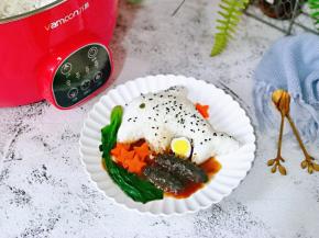 再摆盘，撒上熟黑芝麻就可以啦！