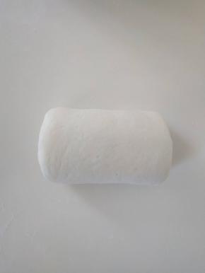 １４、卷起，收紧封口。