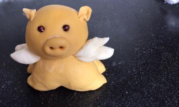 再用白面做出小金猪的小手