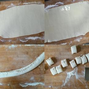 趁着炖煮来做油卷。面团先擀成一个大薄片，涂抹一层食用油，卷起来捏紧收口，切成小剂子。