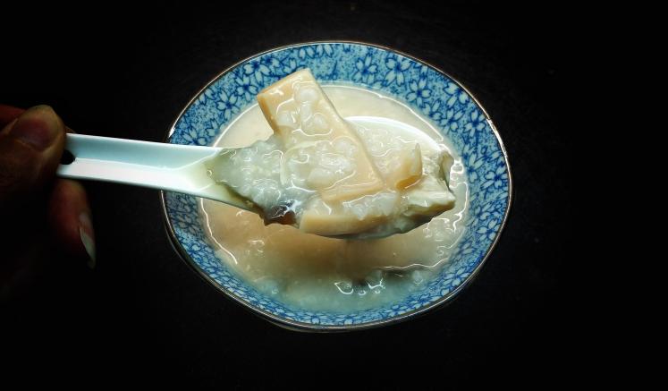响螺皮蛋粥