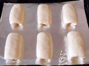 全部卷起，放入烤盘中二次发酵