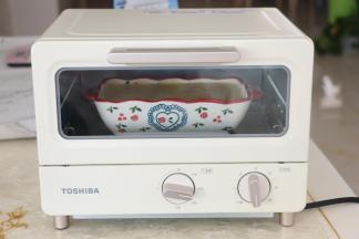 烤箱提前预热，180度25分钟左右，上色满意即可。