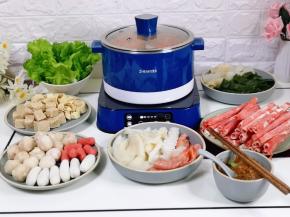 盖上臻米升降锅的盖子，启动火锅功能，大火力烧开。