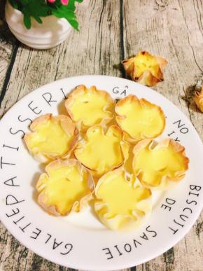 外表酥脆，奶香味儿十足，香嫩幼滑的旺仔脆皮蛋挞就做好了！请君品尝。