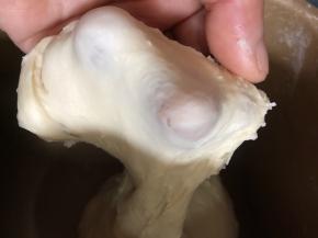 揪出一小块，能撑开套膜即可