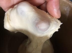 揪出一小块，能撑开套膜即可