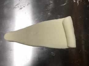 然后从上端卷下来
