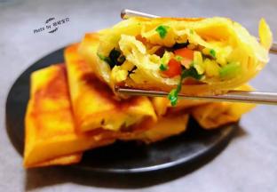 春卷入口外边酥脆里面鲜嫩爽口