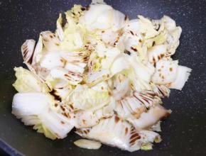 淋入香醋翻炒均匀。