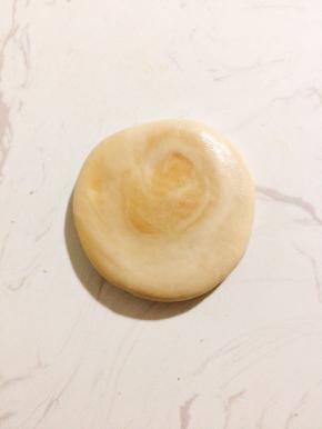 像包包子一样收口，按扁！