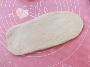 再次擀成牛舌状。
