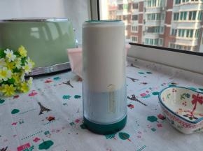 把杯子倒过来，等到自动停止。