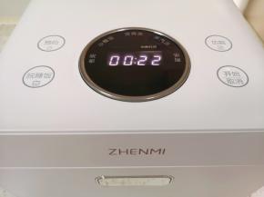 选择电饭煲的“脱糖饭”功能，显示22分钟就能完成。