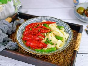 盛出装入面碗中，撒上葱花。