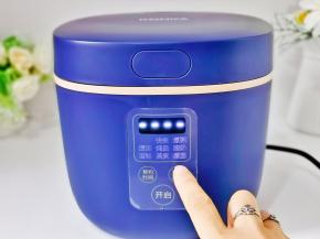 启动电饭煲煮饭模式即可。