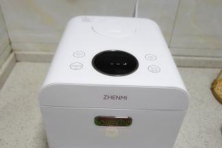 合上盖子，煲饭，时间默认22分钟。每个电饭锅不同，时间略有差异。这个时间刚刚好，可以把米饭煮饭，有可以把淀粉、糖过滤。