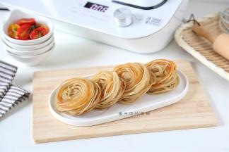 好吃的盘丝饼就做好了，丝丝缕缕，又香又酥脆，简直太好吃了