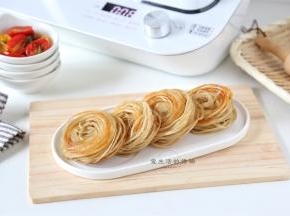 好吃的盘丝饼就做好了，丝丝缕缕，又香又酥脆，简直太好吃了