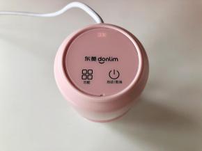 拧好搅拌加热上盖，插好电源，启动“豆浆”功能。