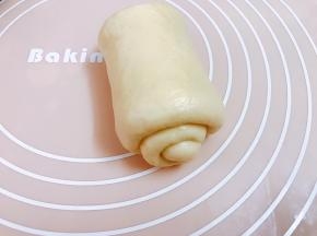 再次擀长卷起