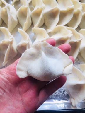 一个漂亮的饺子就包好啦！