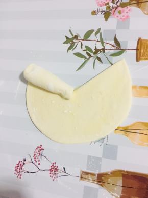 从一头卷起来！