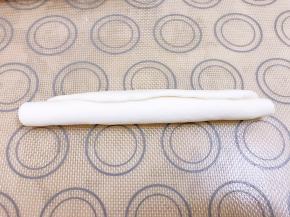 从上往下卷起，一定要卷紧