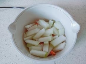 加入冬瓜块翻炒均匀。