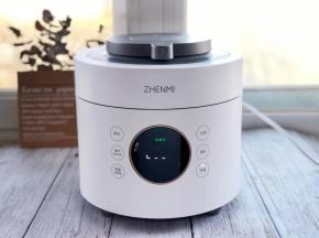 糯米浸泡好后放入高压锅，盖好上盖，启动“精华饭”程序。