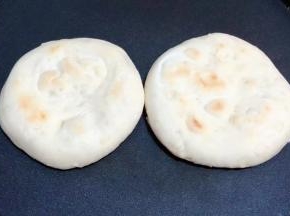 醒好的圆饼放入电饼档上下火加热五分钟即可