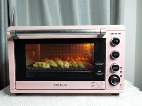 放入预热好的烤箱中层偏下位置。上下175度，烤20-25分钟，上色满意及时加盖锡纸。