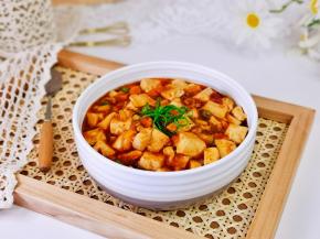 盛出点缀上葱丝。