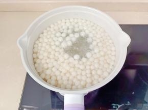 煮到圆子浮起。
