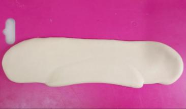 再次檊开呈牛舌状。